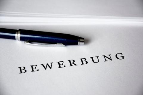 Bewerbungsbogen mit Stift